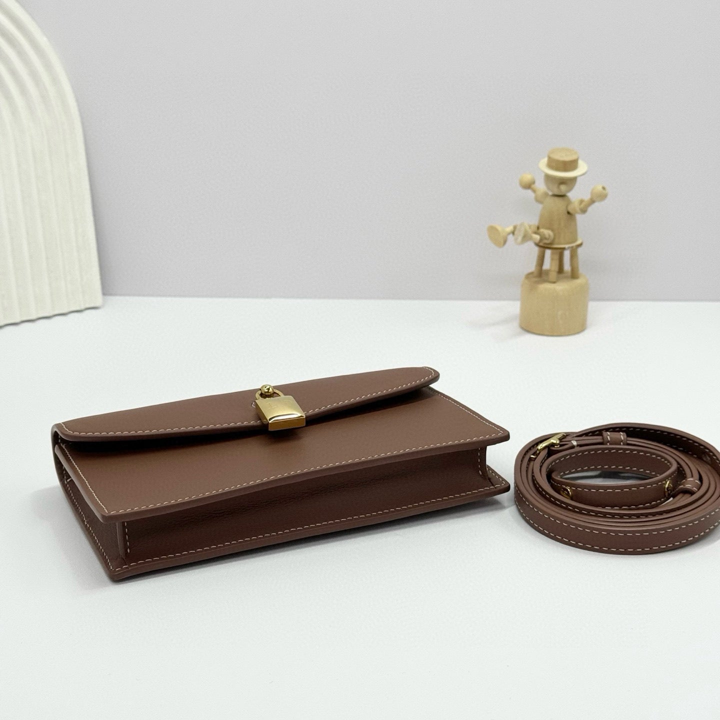 LORO PIANA EXTRA POCHETTE 18 IN CARAMEL SUGAR CALFSKIN GOLD HARDWARE