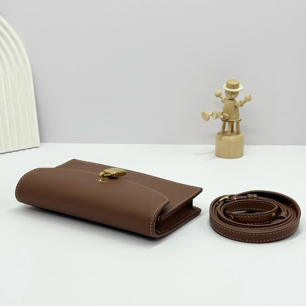 LORO PIANA EXTRA POCHETTE 18 IN CARAMEL SUGAR CALFSKIN GOLD HARDWARE
