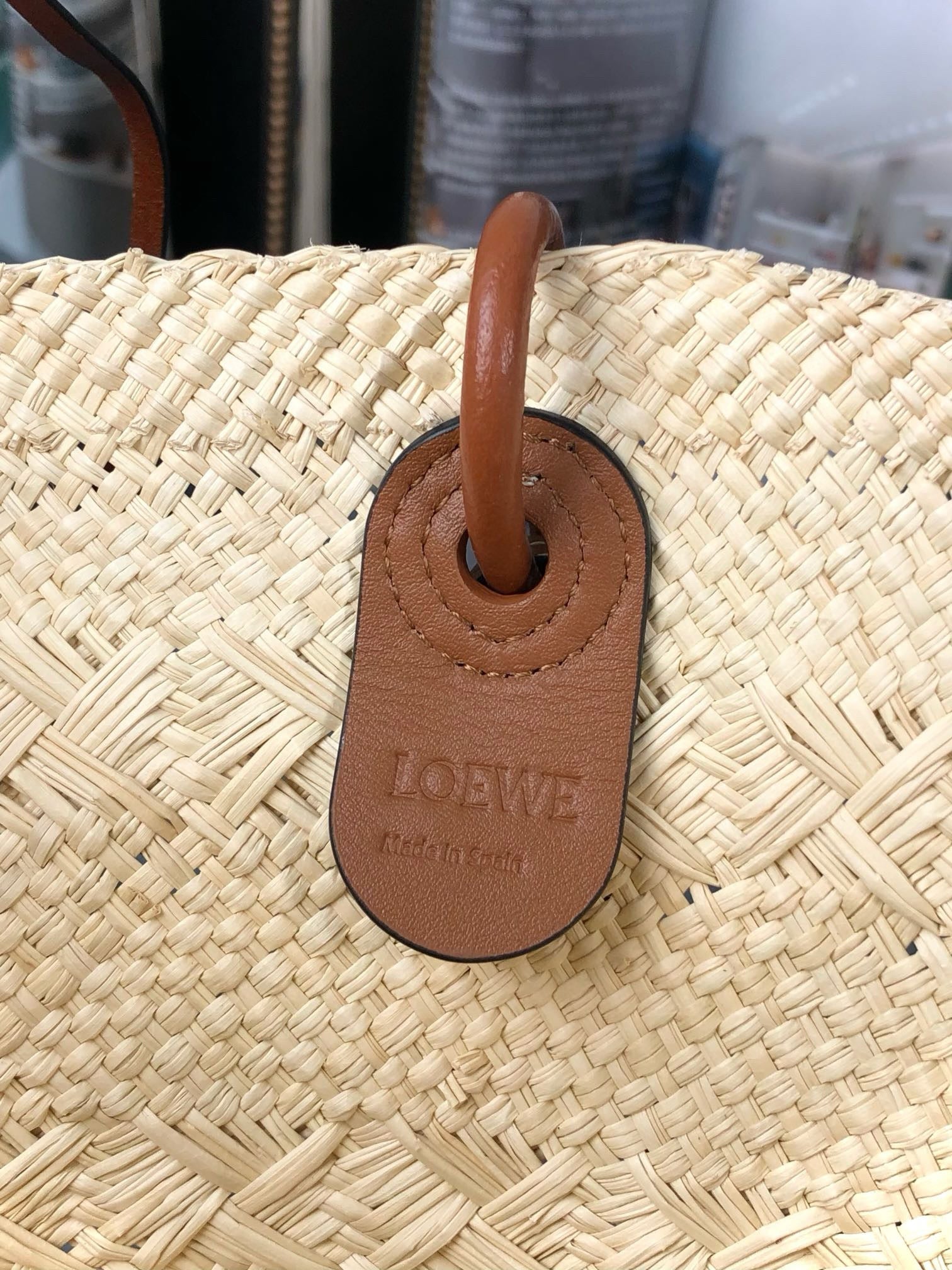 LOEWE MEDIUM ANAGRAM BASKET BAG 46 IN BEIGE IRACA PALM AND TAN CALFSKIN