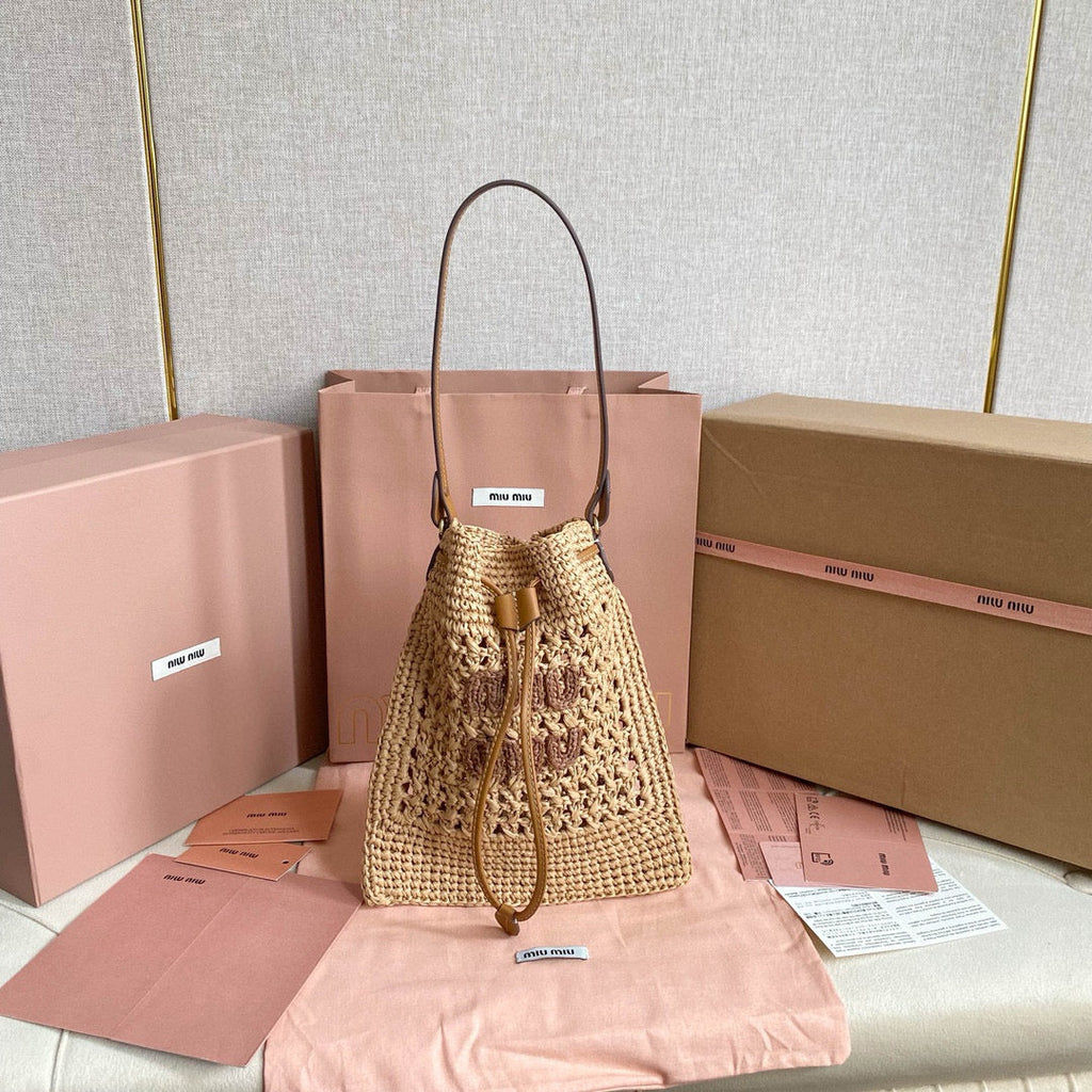 MIU MIU WANDER BUCKET BAG 23 IN NATURAL RAFFIA WITH LEATHER TRIM