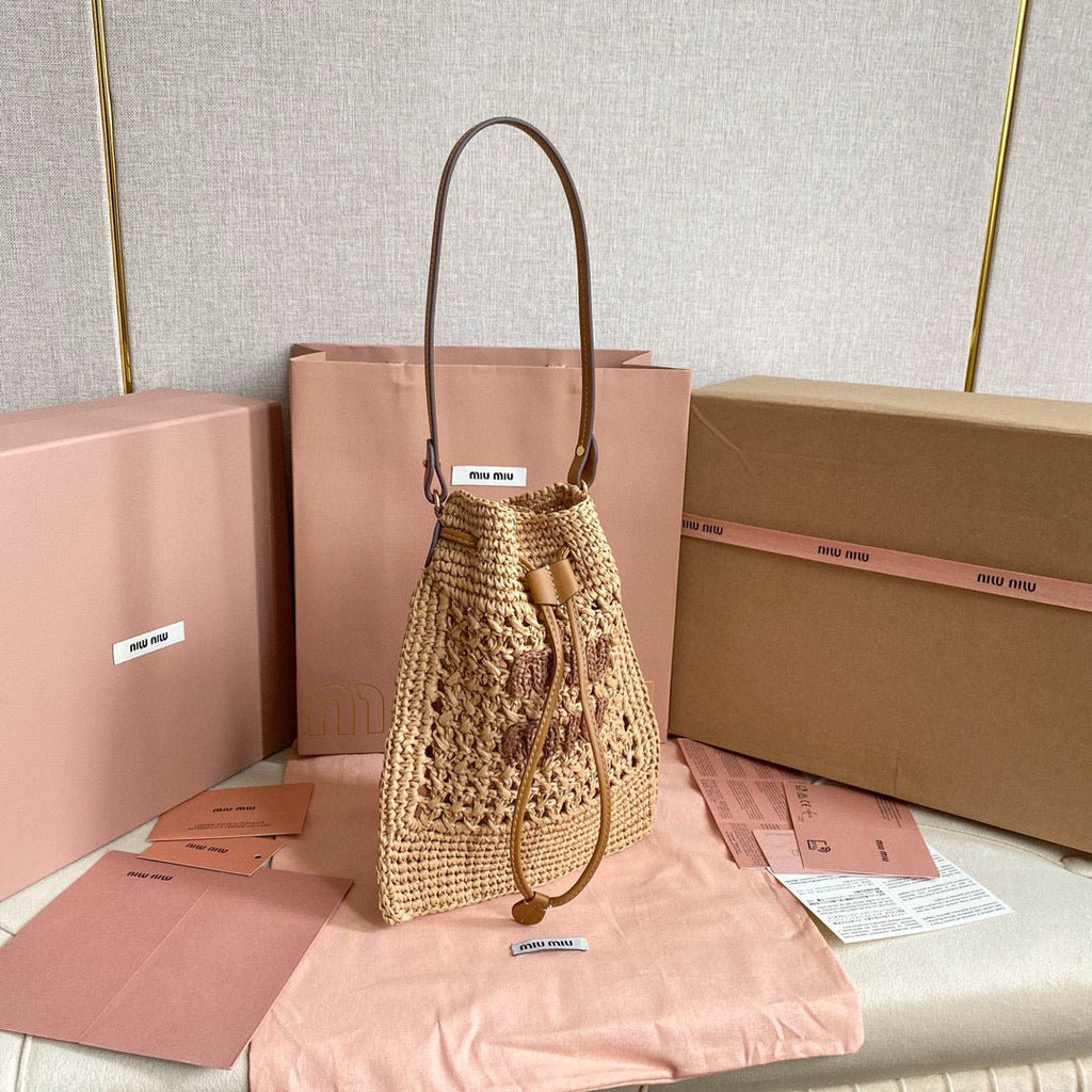 MIU MIU WANDER BUCKET BAG 23 IN NATURAL RAFFIA WITH LEATHER TRIM