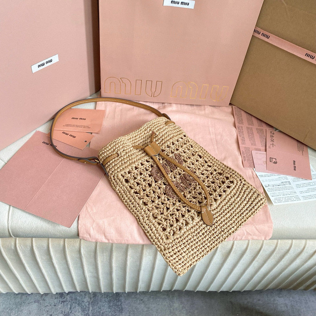 MIU MIU WANDER BUCKET BAG 23 IN NATURAL RAFFIA WITH LEATHER TRIM