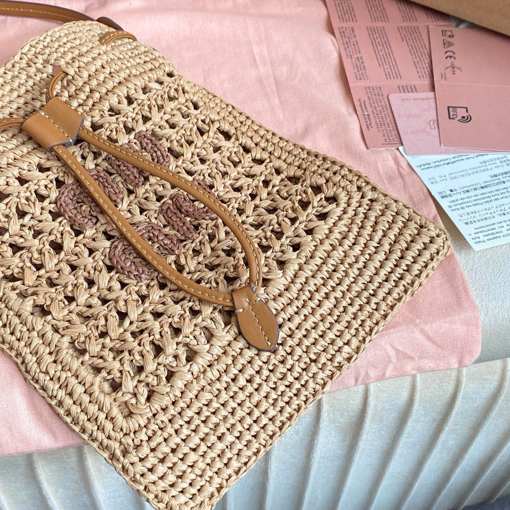 MIU MIU WANDER BUCKET BAG 23 IN NATURAL RAFFIA WITH LEATHER TRIM