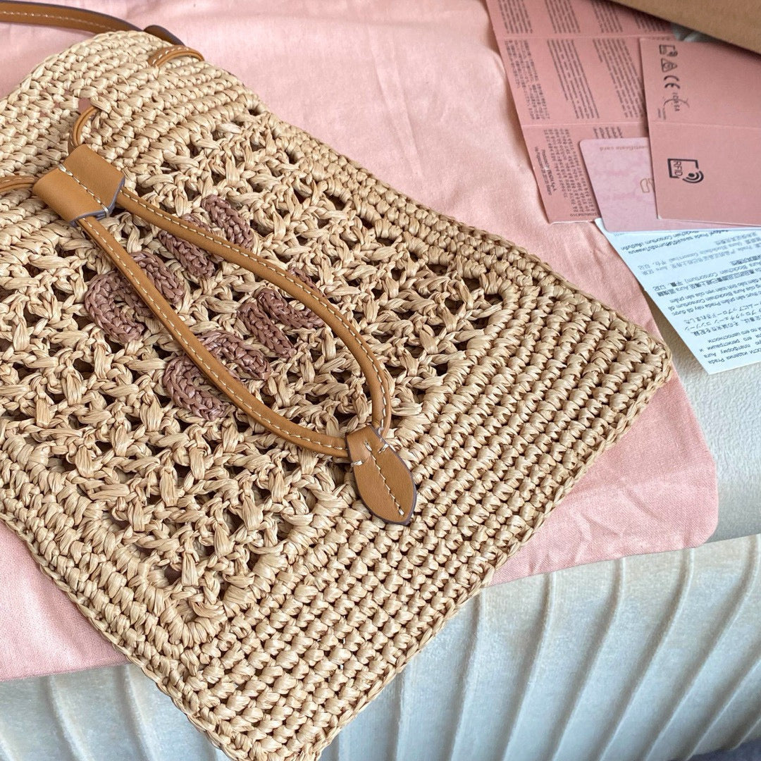 MIU MIU WANDER BUCKET BAG 23 IN NATURAL RAFFIA WITH LEATHER TRIM