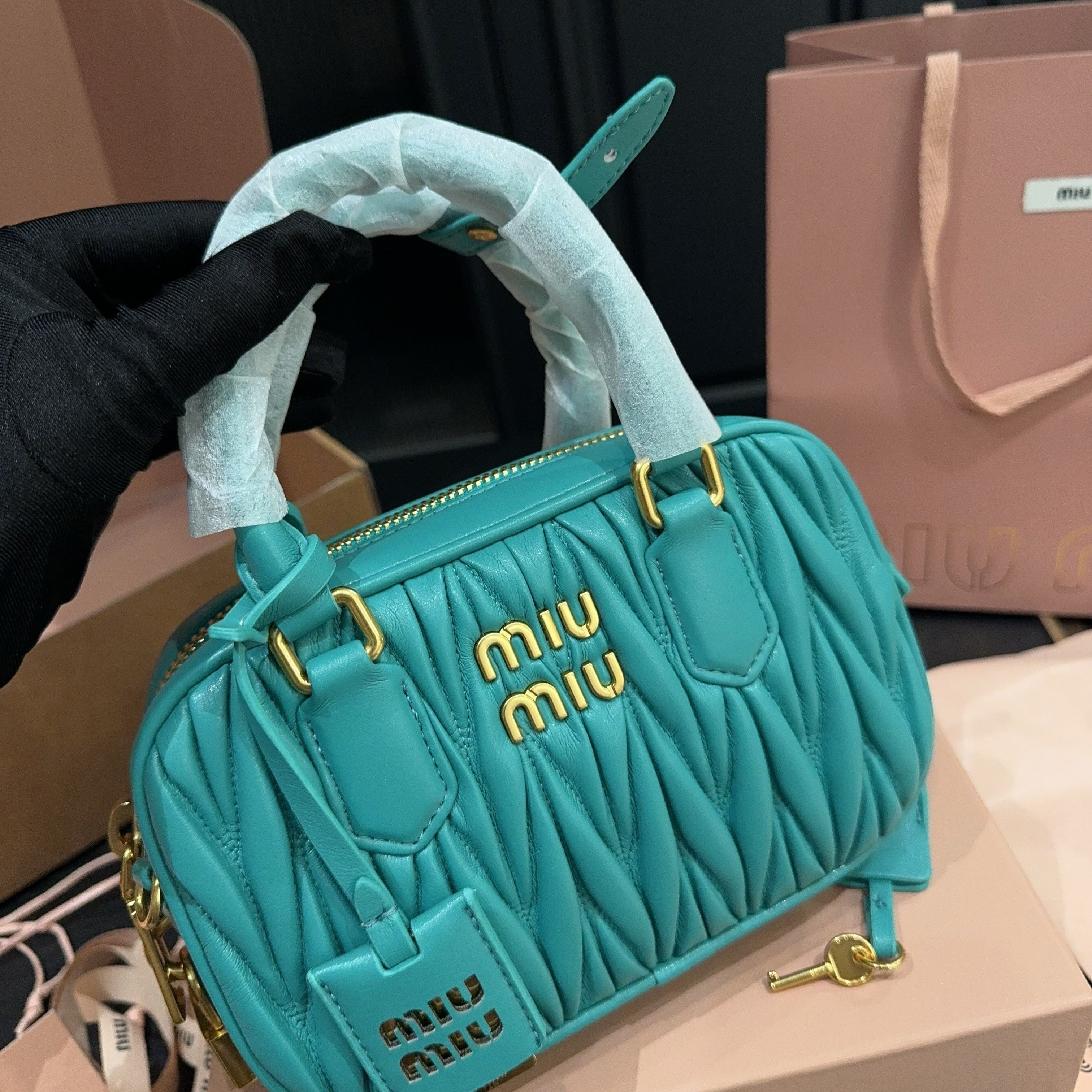 MIU MIU ARCADIE MATELASSÉ BAG 20 IN HIPPIE BLUE LAMBSKIN GOLD HARDWARE