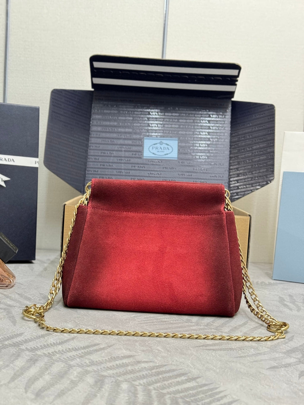 PRADA 25S ENCHAINE MINI BAG 22 IN RUBY RED SUEDE GOLD HARDWRE
