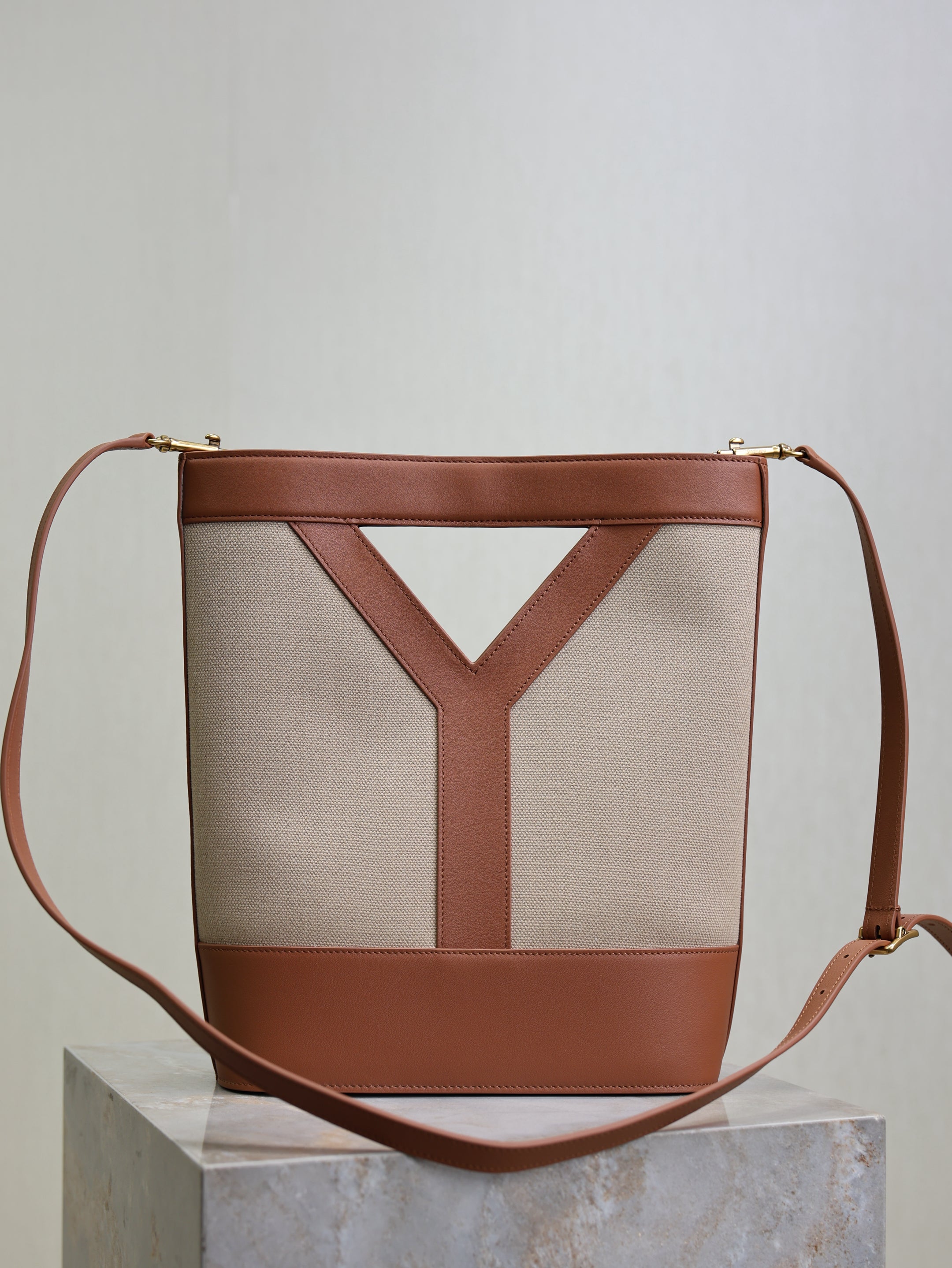 SAINT LAURENT YSL 25S Y SMALL BUCKET 29 IN DESERT DUST AND BRICK CANVAS GOLD HARDWRE