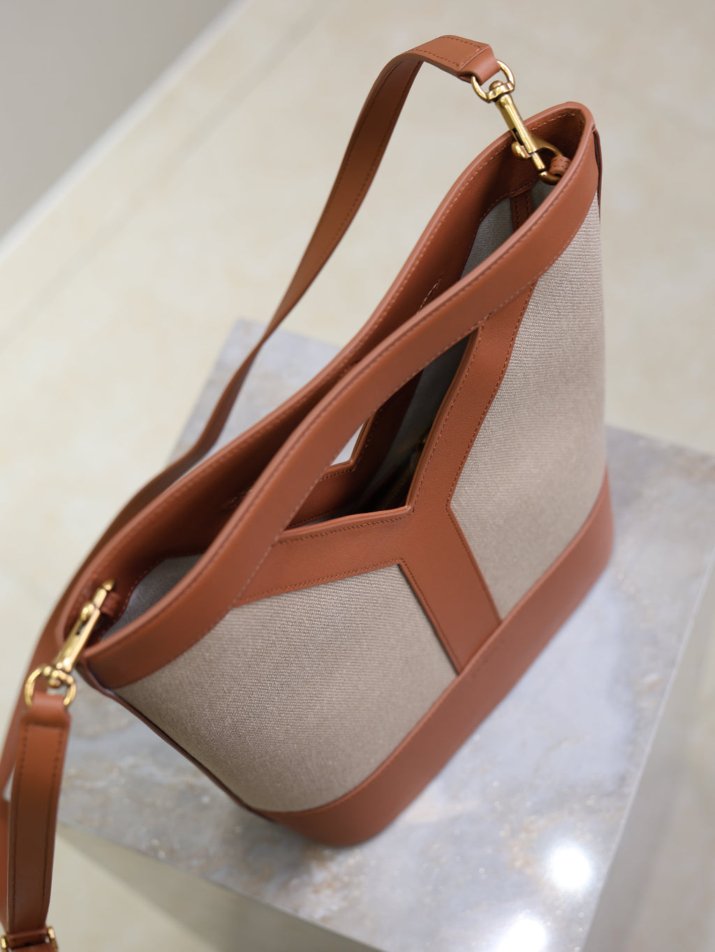 SAINT LAURENT YSL 25S Y SMALL BUCKET 29 IN DESERT DUST AND BRICK CANVAS GOLD HARDWARE
