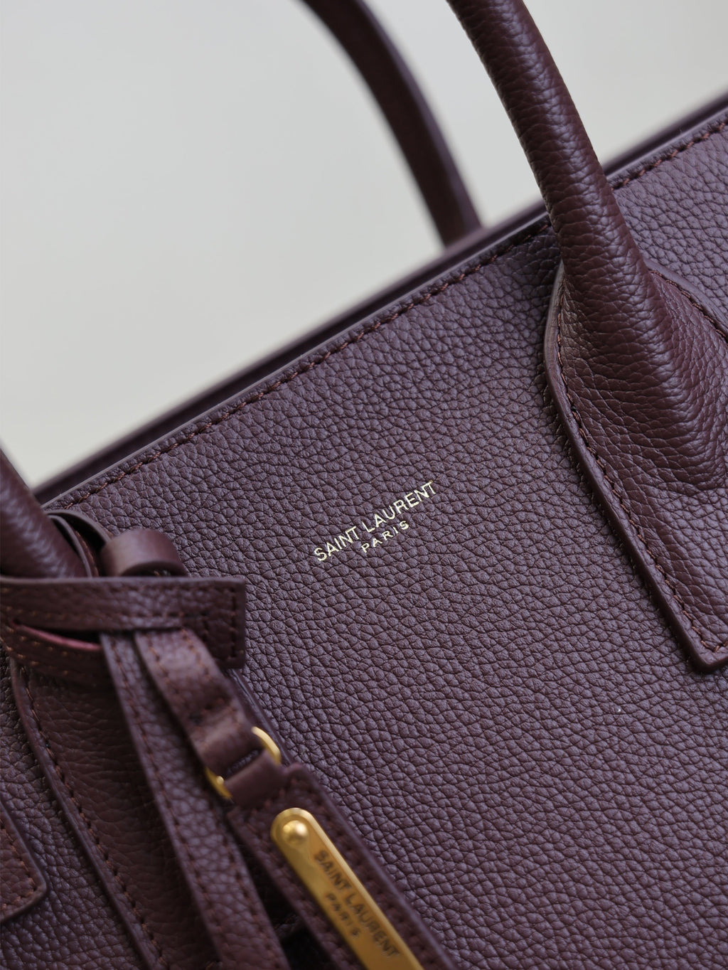 SAINT LAURENT YSL 25S SAC DE JOUR GM 32 IN ROUGE CABERNET SUPPLE GRAINED CALFSKIN