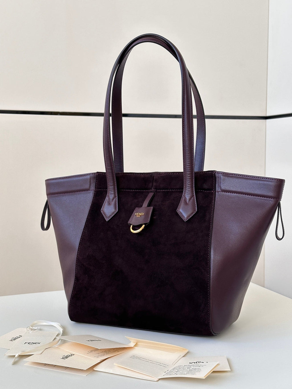 FENDI ORIGAMI MEDIUM 27 IN WINE RED LAMBSKIN AND SUEDE