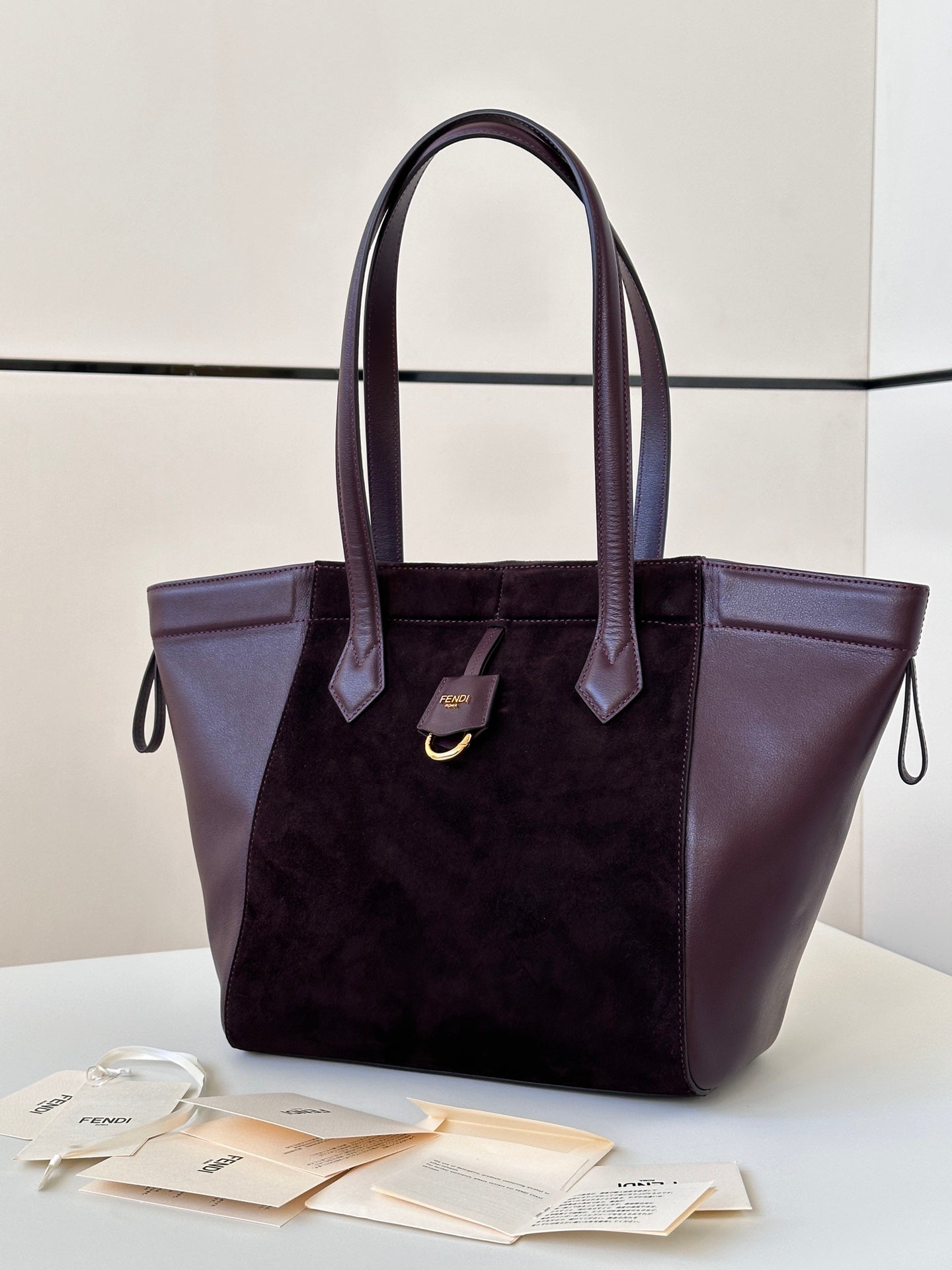 FENDI ORIGAMI MEDIUM 27 IN WINE RED LAMBSKIN AND SUEDE