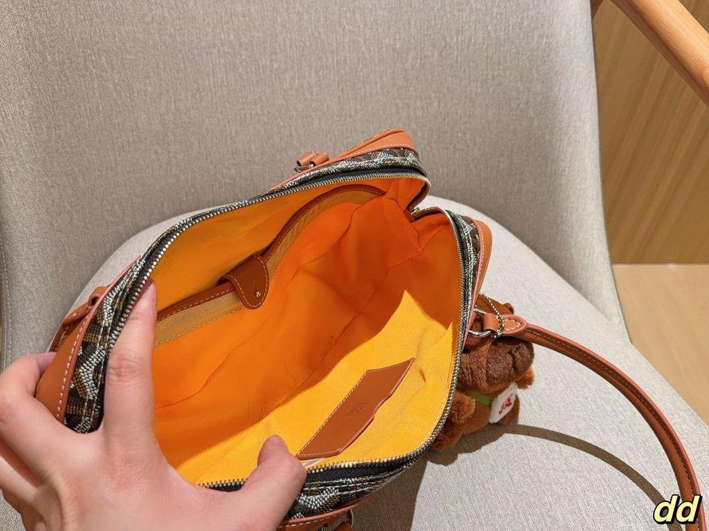 GOYARD SAINT MARTIN BAG 35 IN BROWN GOYARDINE CANVAS AND CALFSKIN
