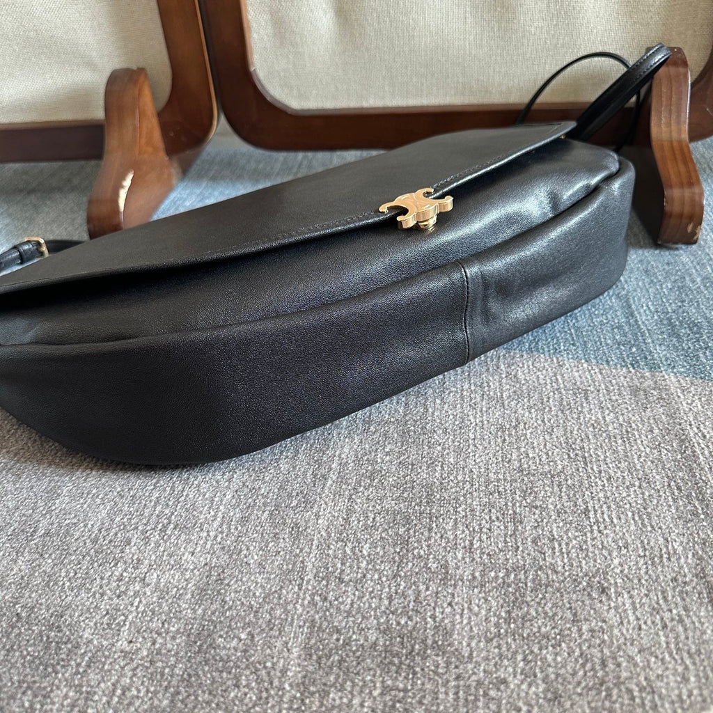 CELINE 25S HALFMOON SOFT TRIOMPHE BAG 46MM IN BLACK SUPPLE SHINY LAMBSKIN