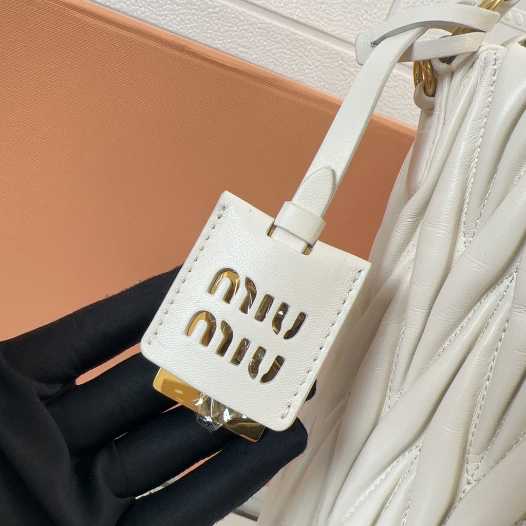 MIU MIU MATELASSÉ HANDBAG 20 IN WHITE LAMBSKIN