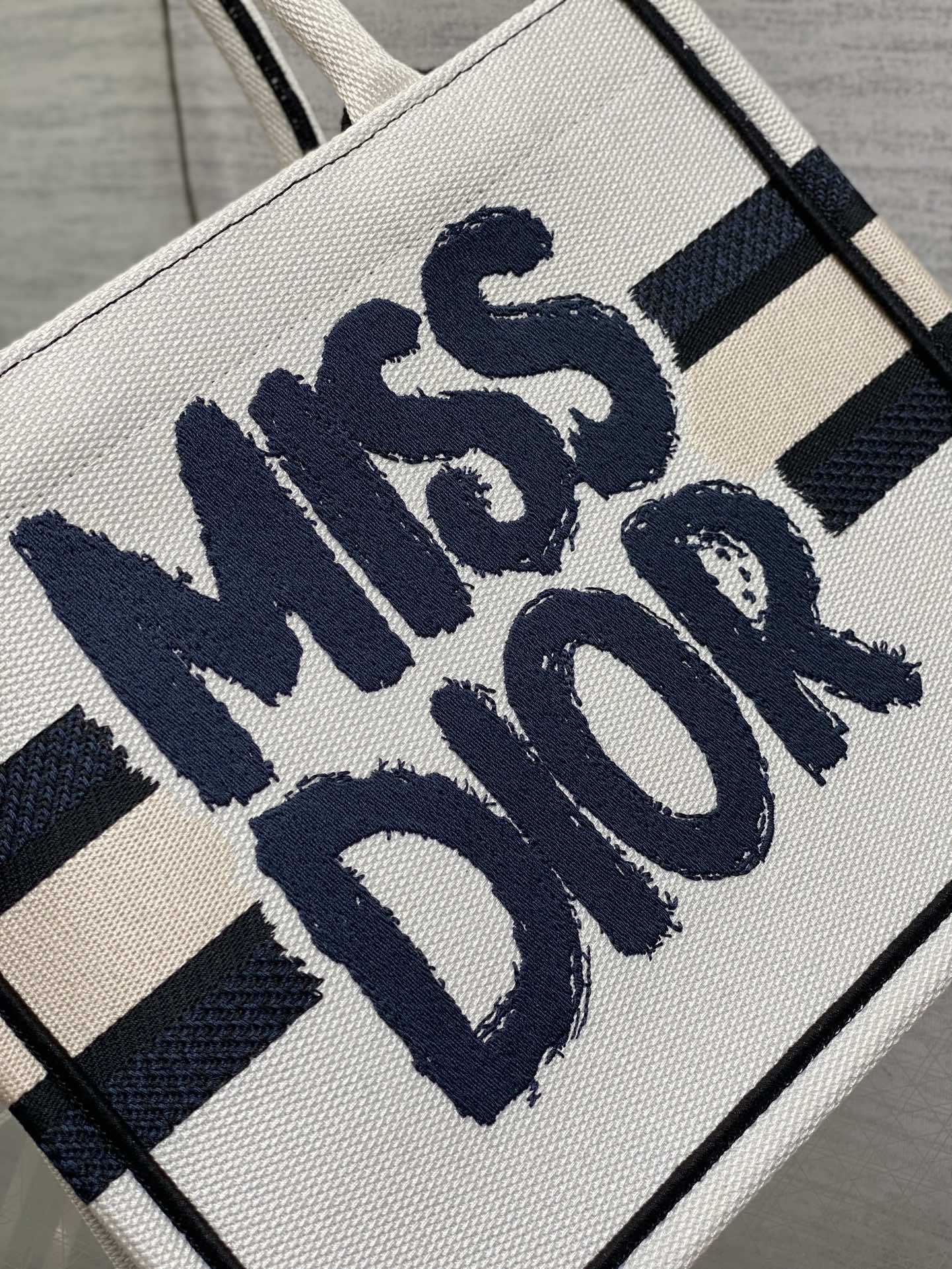 DIOR BOOK TOTE 26 IN WHITE MIX BLACK CANVAS 226503