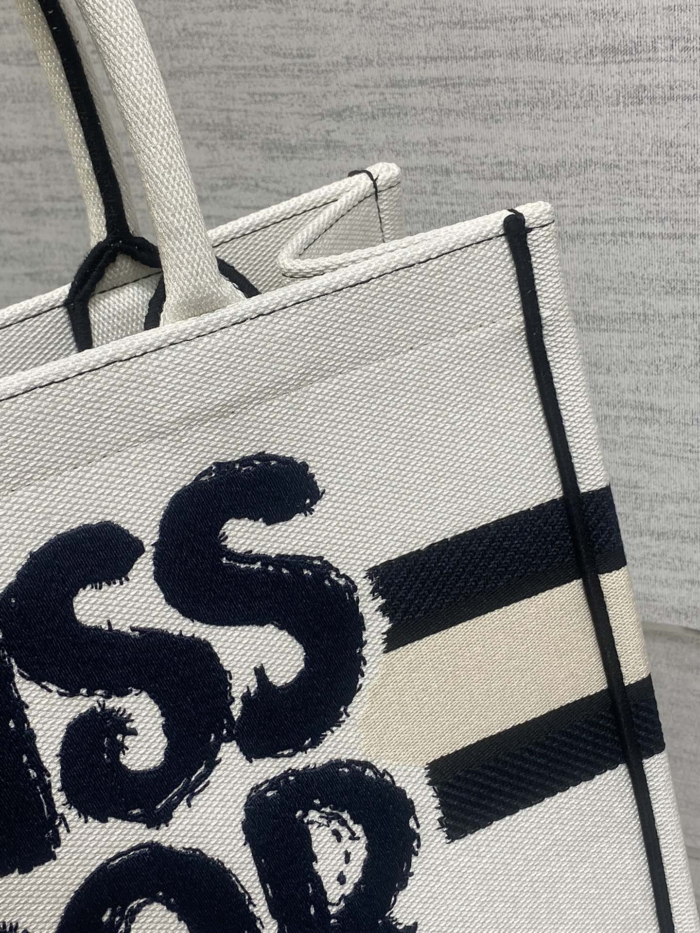 DIOR MEDIUM BOOK TOTE 36 IN WHITE MIX BLACK CANVAS 226504