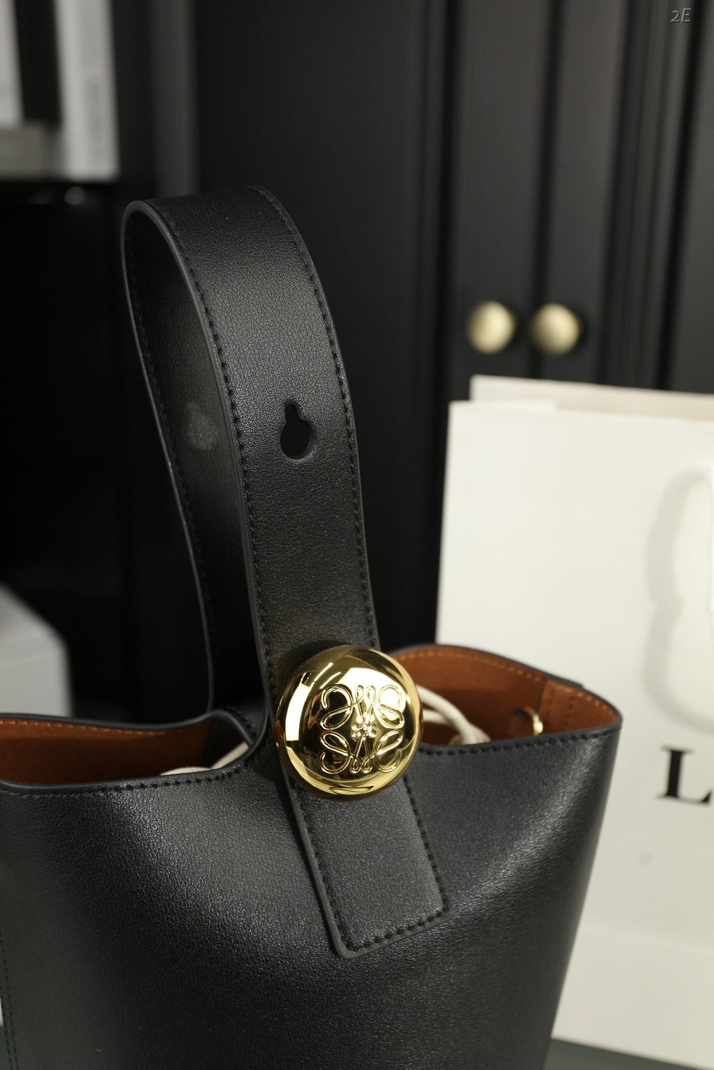 LOEWE LOE MINI 19 PEBBLE BUCKET IN BLACK MELLOW CALFSKIN