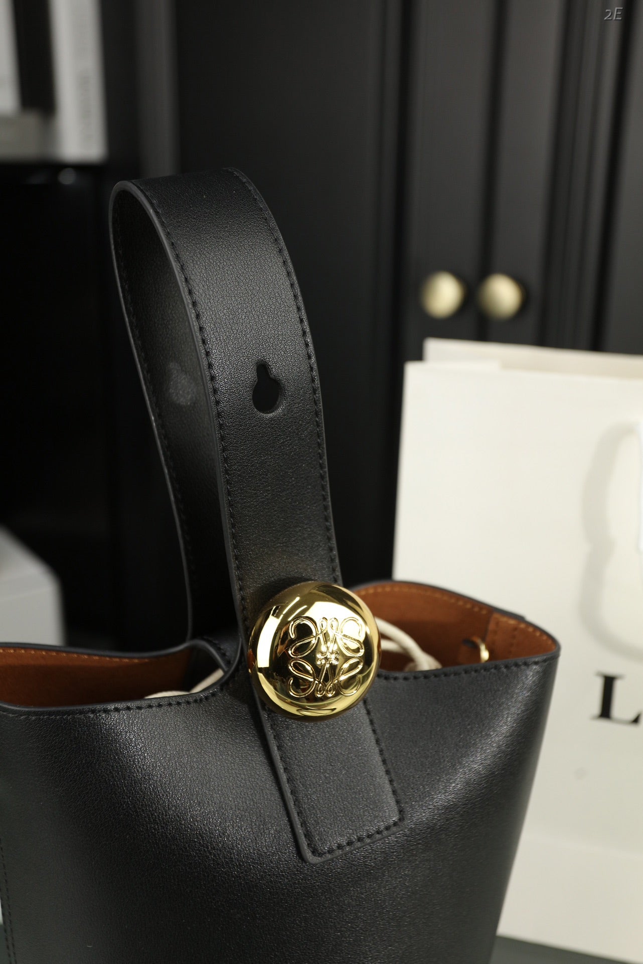 LOEWE LOE MINI 19 PEBBLE BUCKET IN BLACK MELLOW CALFSKIN