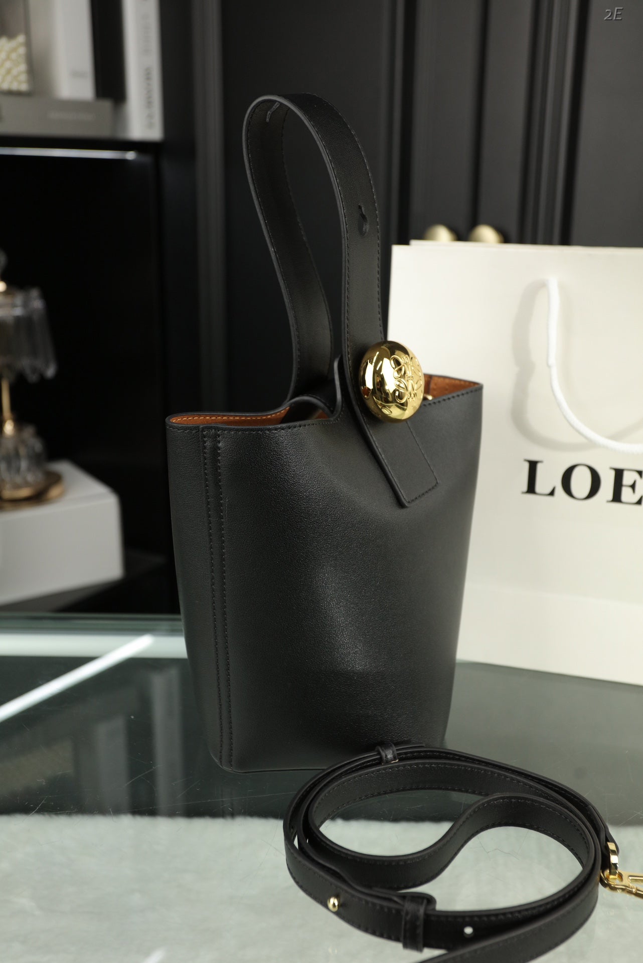 LOEWE LOE MINI 19 PEBBLE BUCKET IN BLACK MELLOW CALFSKIN