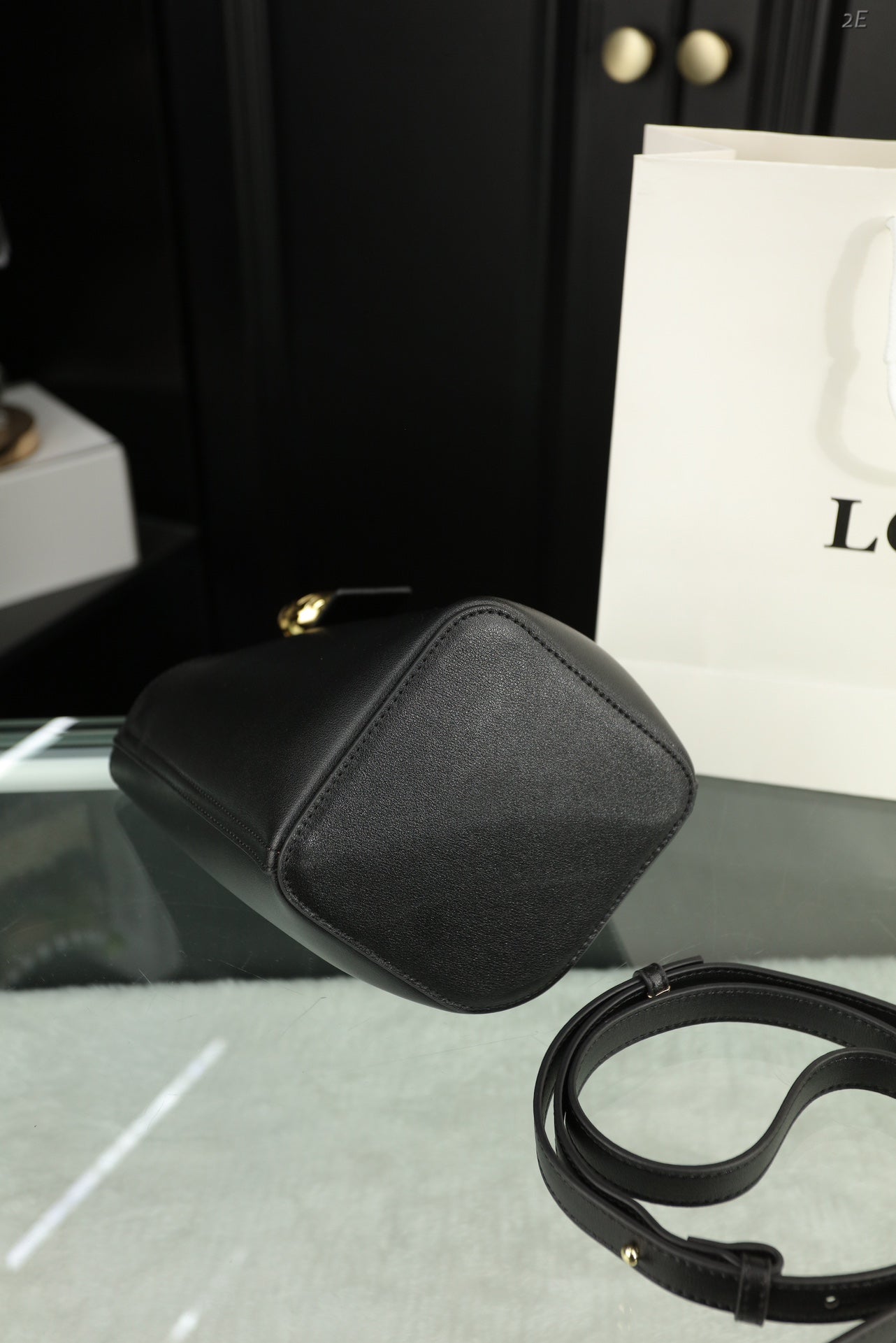 LOEWE LOE MINI 19 PEBBLE BUCKET IN BLACK MELLOW CALFSKIN