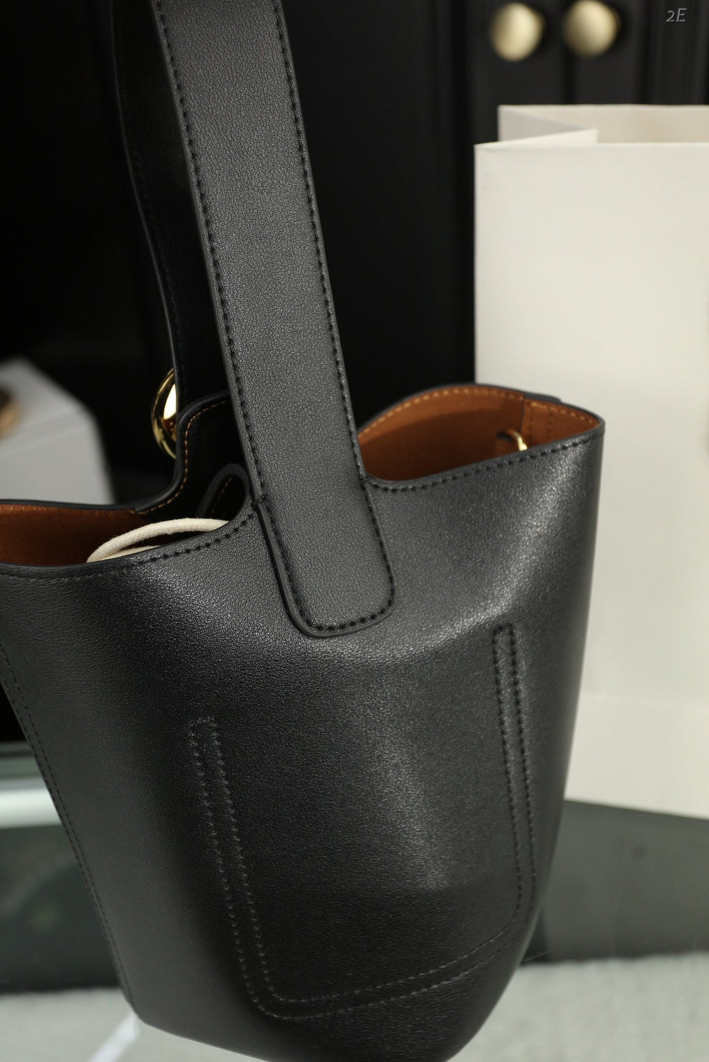 LOEWE LOE MINI 19 PEBBLE BUCKET IN BLACK MELLOW CALFSKIN