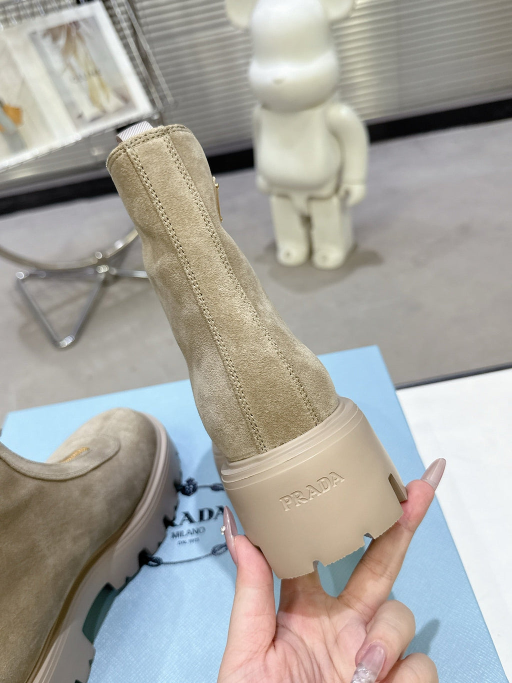 PRADA 25S ZIP-UP ANKLE BOOTS IN BEIGE SUEDE