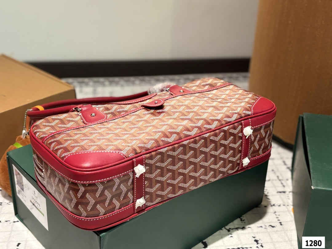 GOYARD SAINT MARTIN BAG 35 IN BURGUNDY RED GOYARDINE CANVAS AND CALFSKIN