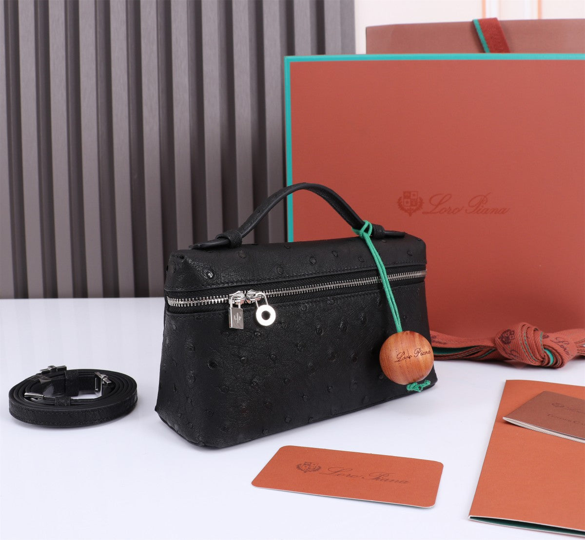 LORO PIANA EXTRA POCKET L19 IN BLACK OSTRICH LEATHER
