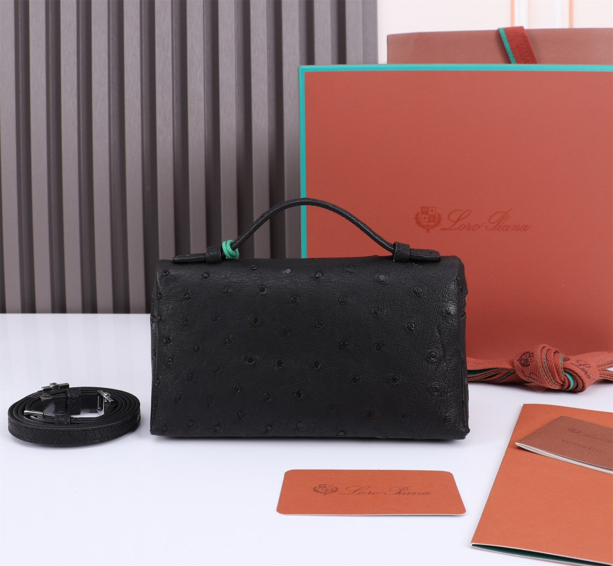 LORO PIANA EXTRA POCKET L19 IN BLACK OSTRICH LEATHER