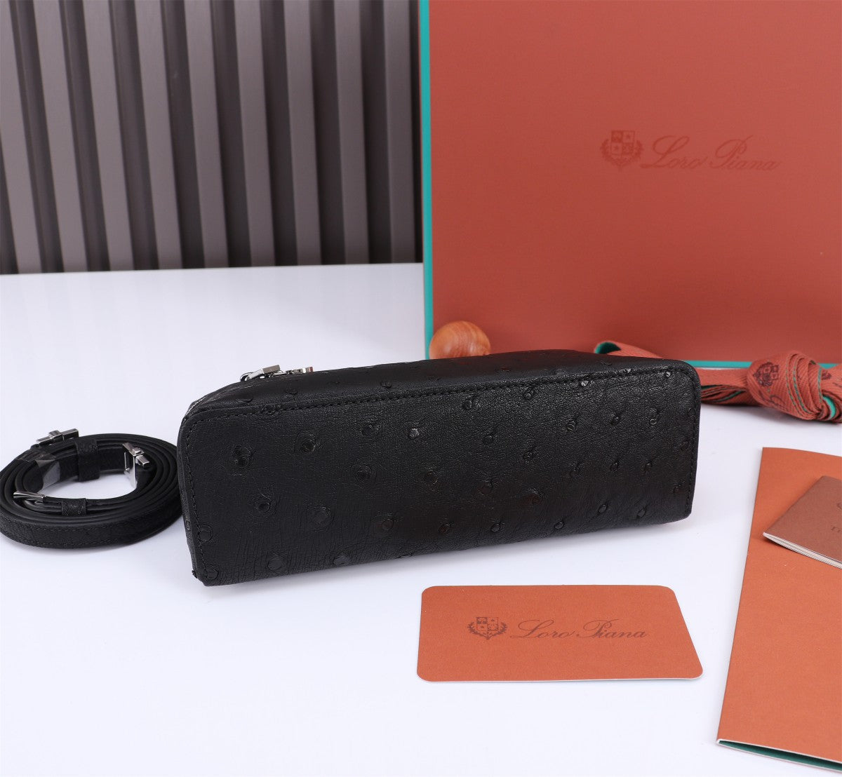 LORO PIANA EXTRA POCKET L19 IN BLACK OSTRICH LEATHER