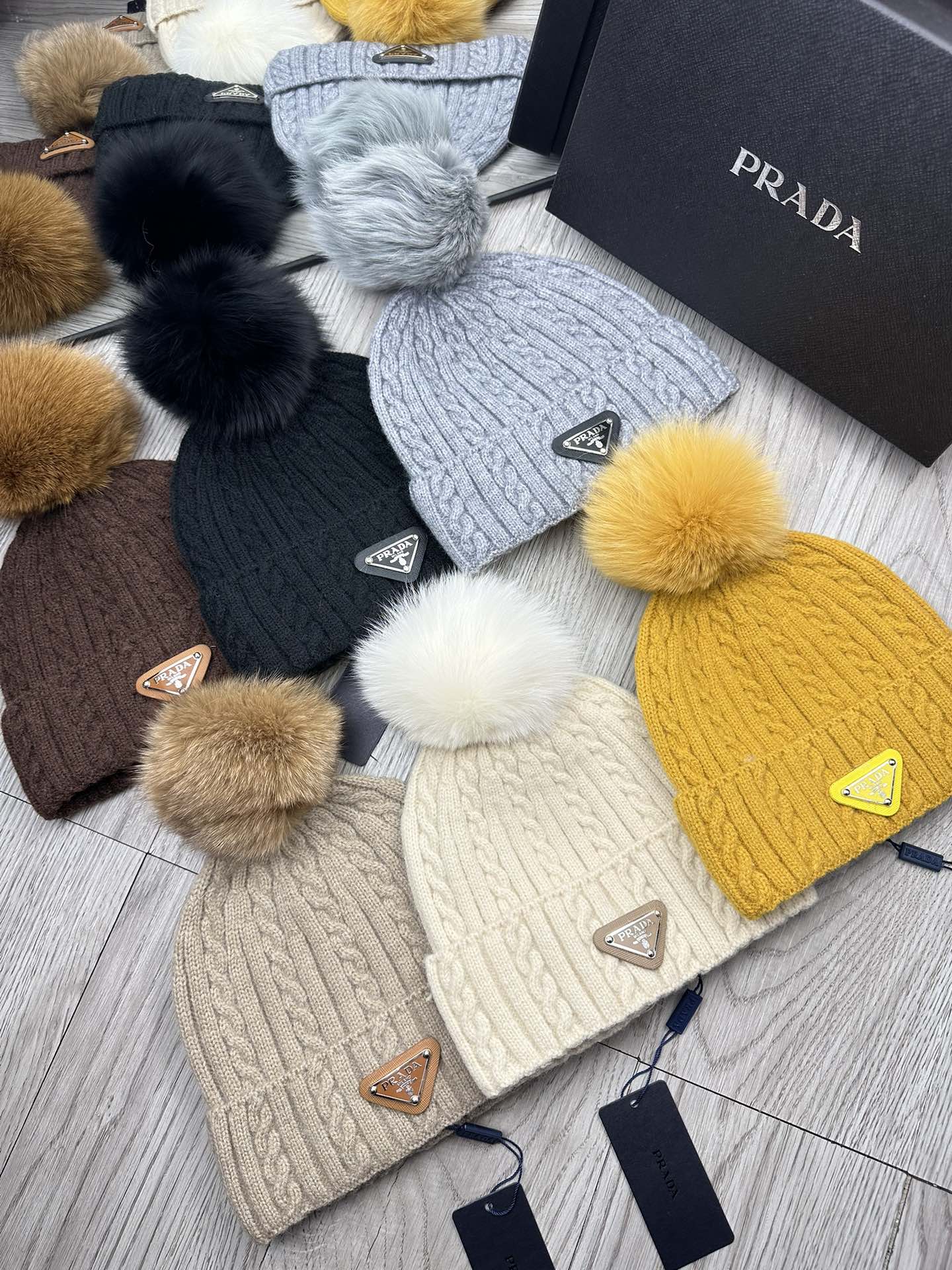PRADA BEANIE HAT IN BLACK WOOL 352368