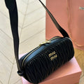 FENDI BAGUETTE 25 BAG IN BLACK SHEEPSKIN