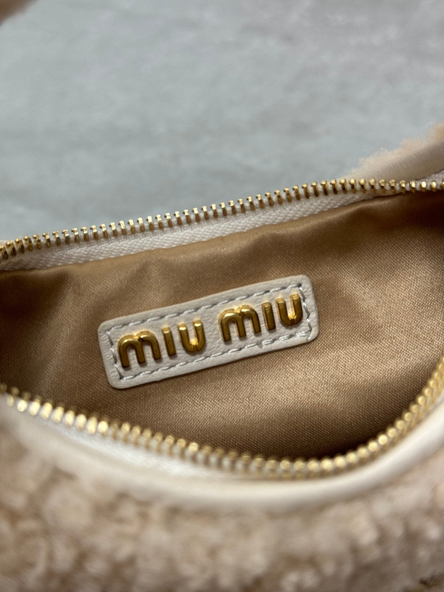 MIU MIU WANDER HOBO BAG 18 IN BEIGE SHEARLING