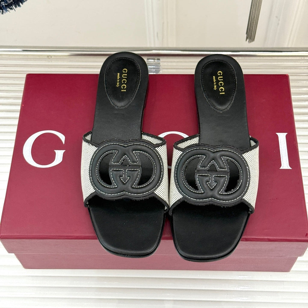 GUCCI SLIDE SANDALS IN BLACK AND WHITE CALFSKIN