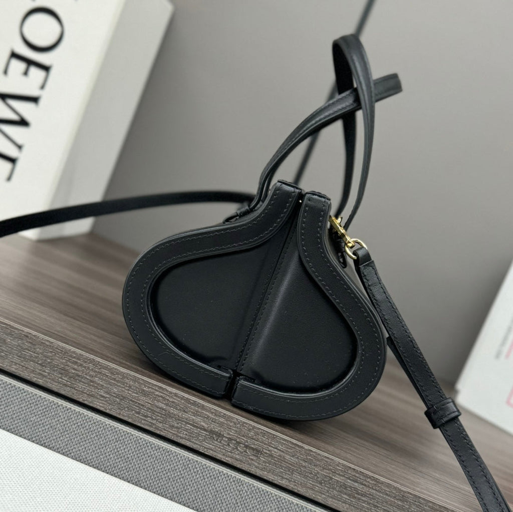 LOEWE CYLINDER BAG 25 IN BLACK CALFSKIN