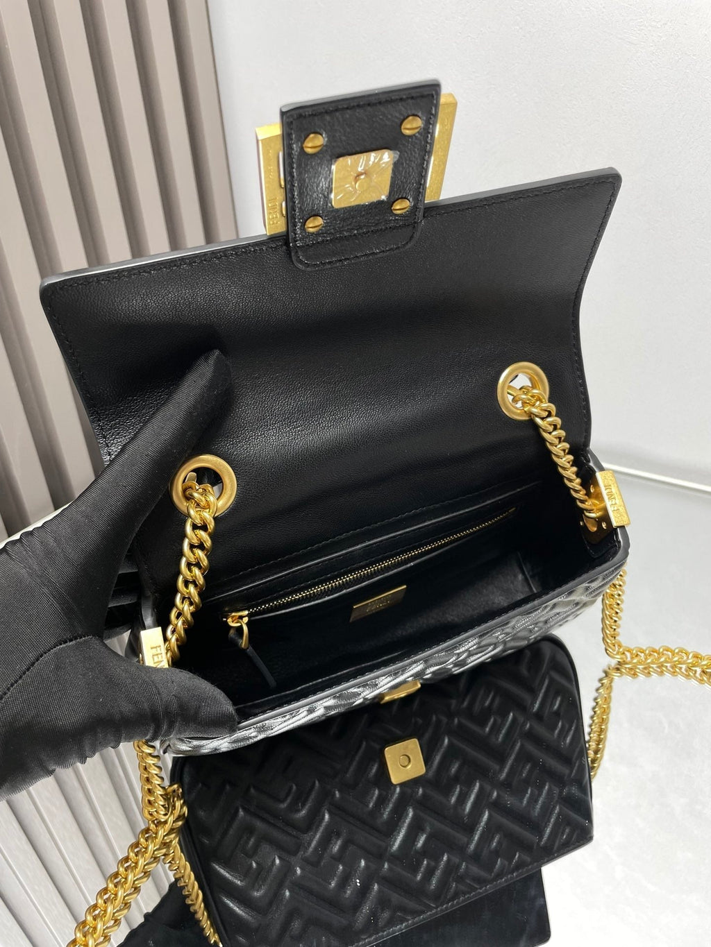 FENDI Fend Baguette 24 Bag With FF Motif Black Leather Ghw