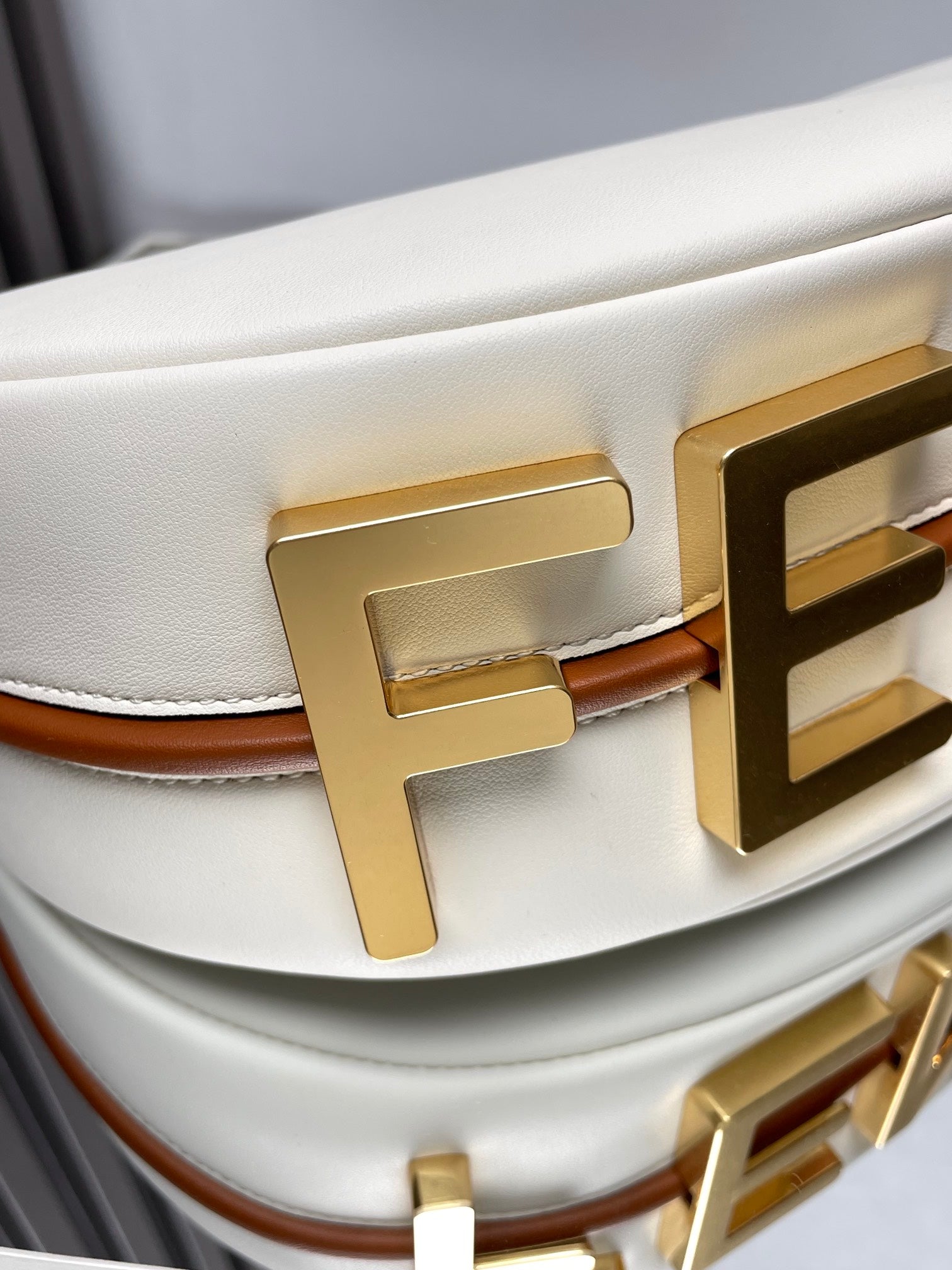 FENDI FENDIGRAPHY MEDIUM 29 IN WHITE AND ORANGE TRIM SMOOTH LAMBSKIN GOLD HARDWARE