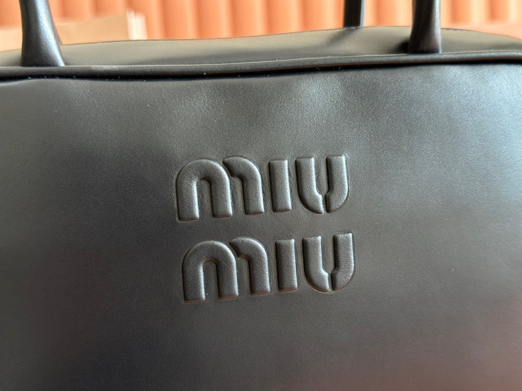 MIU MIU BEAU TOP HANDLE BAG 29 IN BLACK GLOSSY CALFSKIN