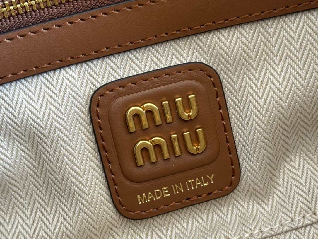 MIU MIU BEAU TOP HANDLE BAG 28 IN COGNAC LEATHER PATCHWORK