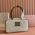 MIU MIU BOWLING BAG 28 IN WHITE CANVAS AND BROWN CALFSKIN TRIM