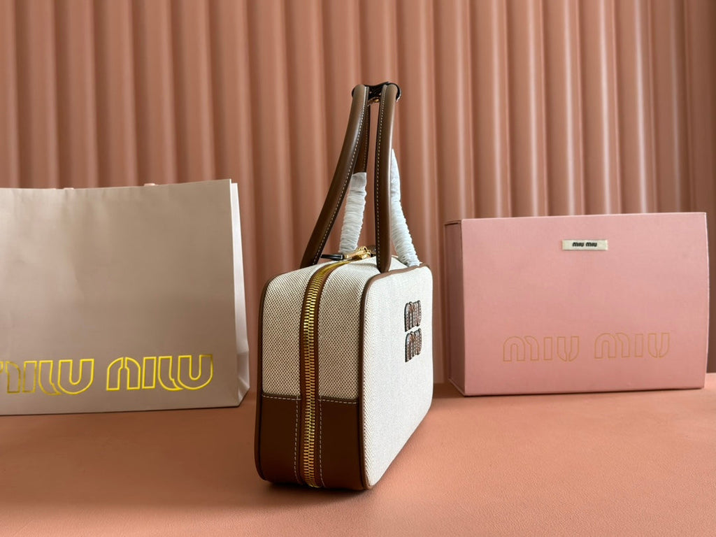 MIU MIU BOWLING BAG 28 IN WHITE CANVAS AND BROWN CALFSKIN TRIM