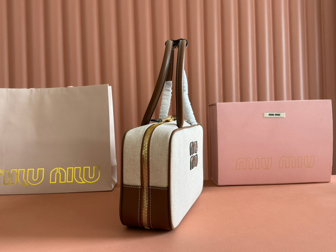 MIU MIU BOWLING BAG 28 IN WHITE CANVAS AND BROWN CALFSKIN TRIM