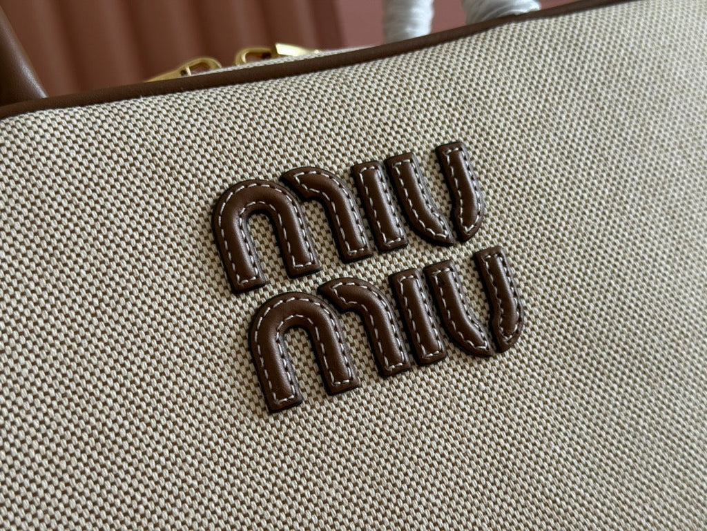 MIU MIU BOWLING BAG 28 IN WHITE CANVAS AND BROWN CALFSKIN TRIM