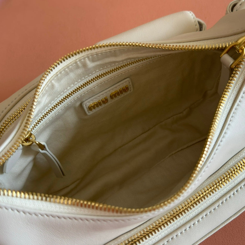 MIU MIU POCKET HANDBAG 21 IN WHITE CALFSKIN