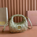 MIU MIU WANDER MATELASSÉ NAPPA MINI BAG 18 IN GOLDEN LAMBSKIN