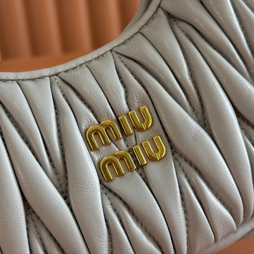 MIU MIU WANDER MATELASSÉ NAPPA MINI BAG 18 IN LIGHT BLUE LAMBSKIN