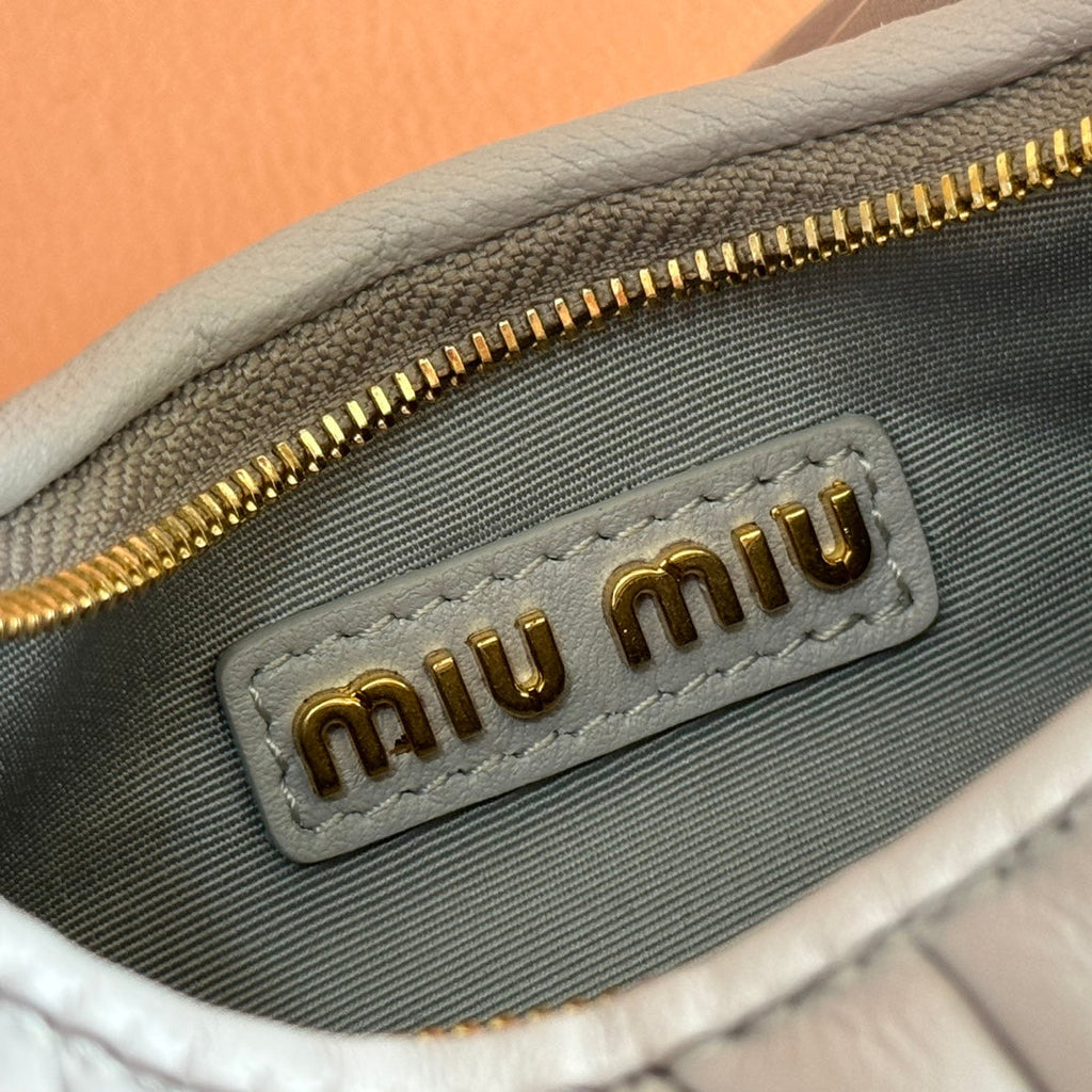MIU MIU WANDER MATELASSÉ NAPPA MINI BAG 18 IN LIGHT BLUE LAMBSKIN