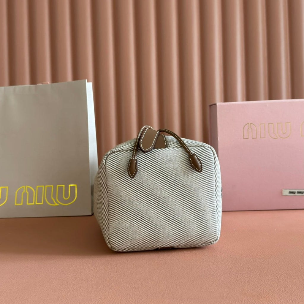 MIU MIU BUCKET BAG 22 BEIGE AND BRANDY IN CANVAS