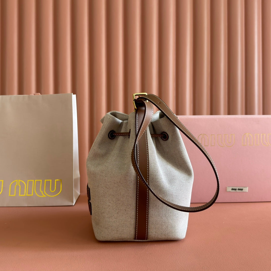MIU MIU BUCKET BAG 22 BEIGE AND BRANDY IN CANVAS