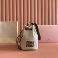 MIU MIU BUCKET BAG 22 BEIGE AND BRANDY IN CANVAS